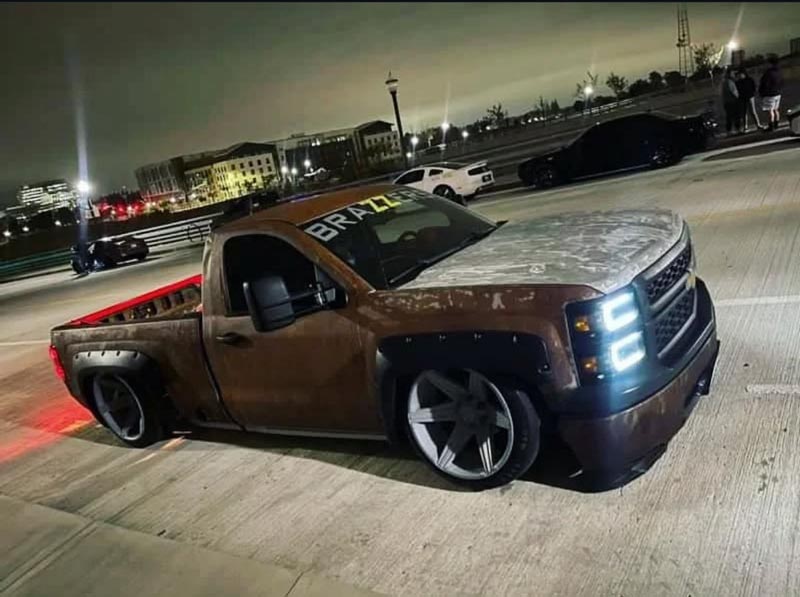 Night shot showing LED lighting and slammed profile on pavement