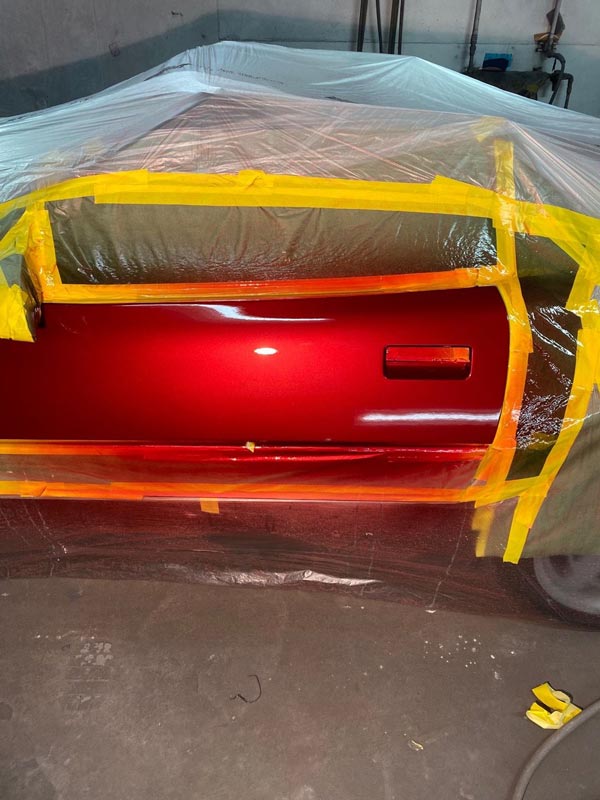Corvette C4 masked and prepared for red paint application