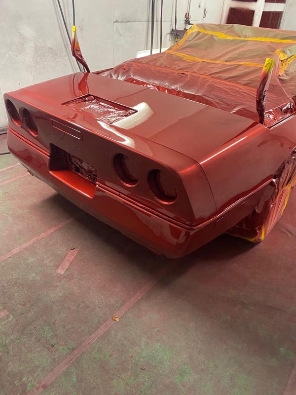 Finished red paint showing high-gloss professional finish