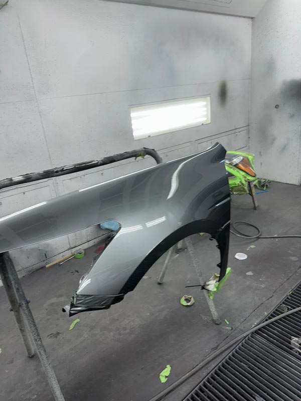 Fender panel with gray paint application