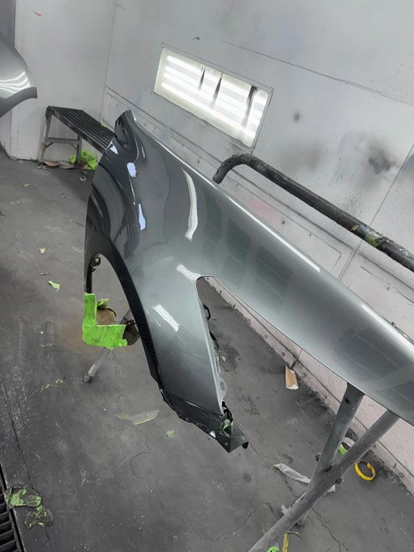 Multiple body panels in spray booth setup