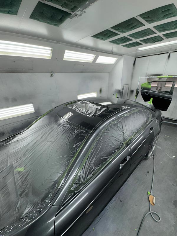 Paint booth preparation with proper ventilation and lighting