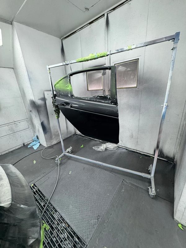 Body panel work with precision repair frame setup