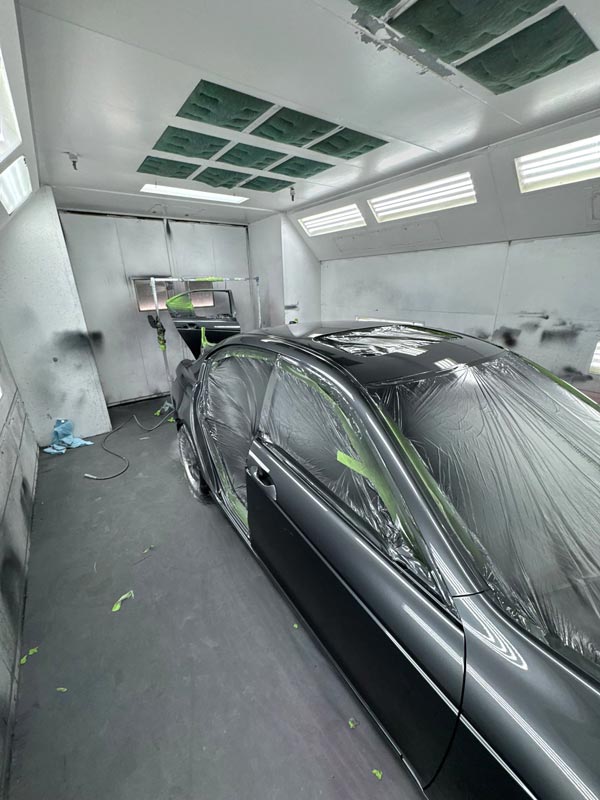 Final stages of professional paint restoration