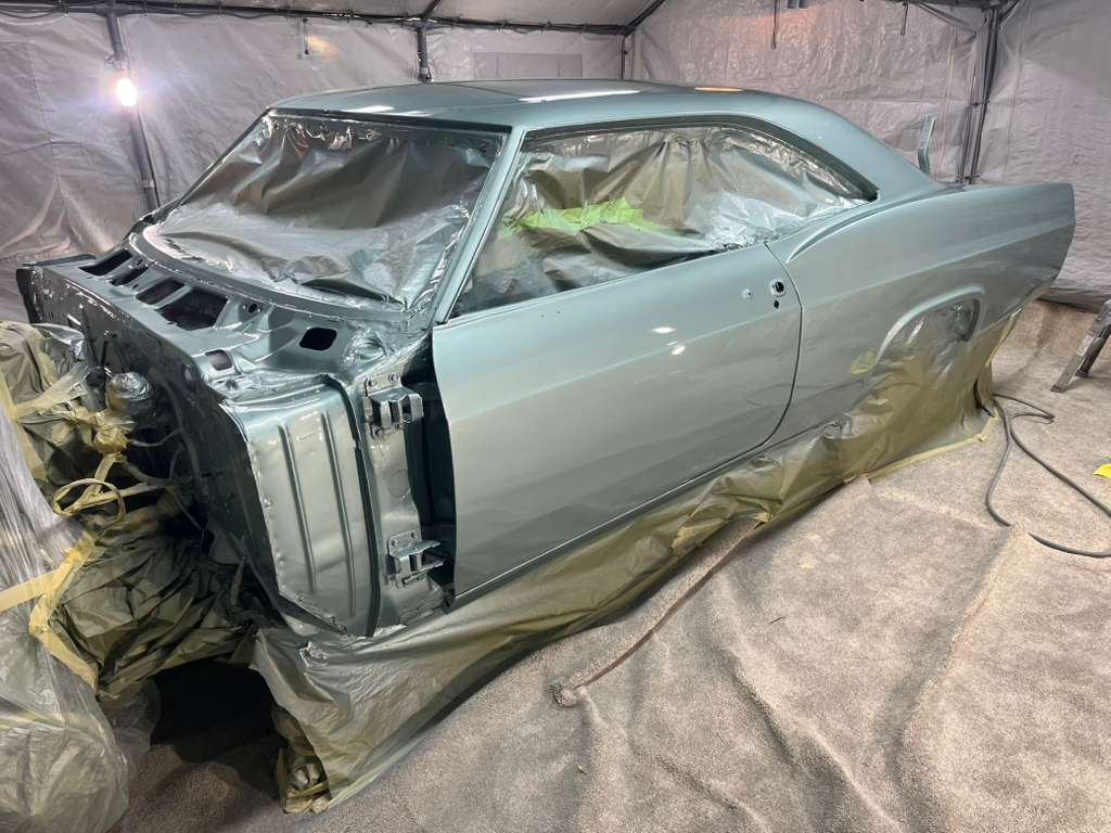 Blue-green metallic paint applied - front view