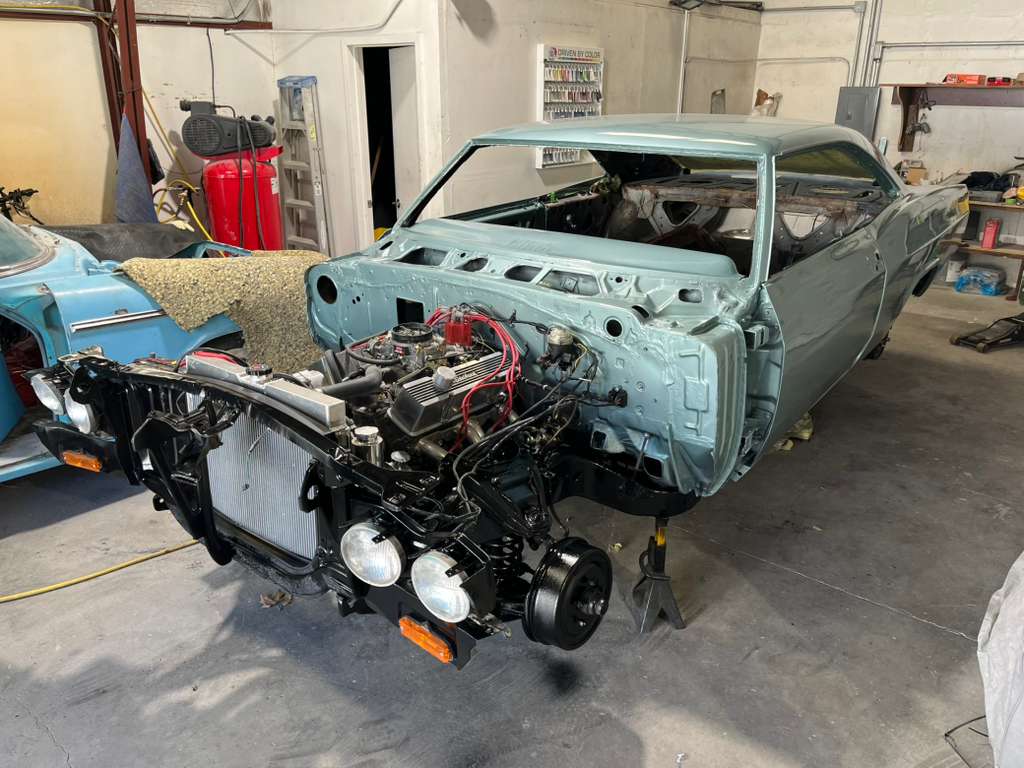 Reassembly in progress with painted body