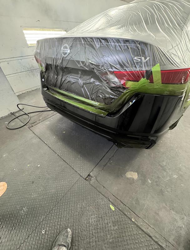 Final paint stage with protective masking still in place