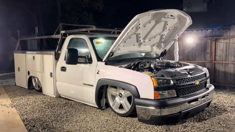 Night shot showcasing lowered stance and custom wheels