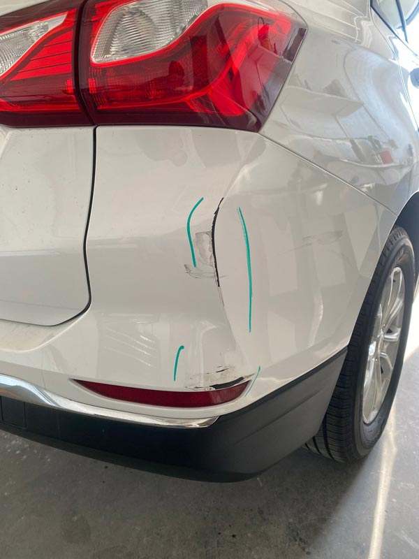 SUV damage assessment with precision repair markings
